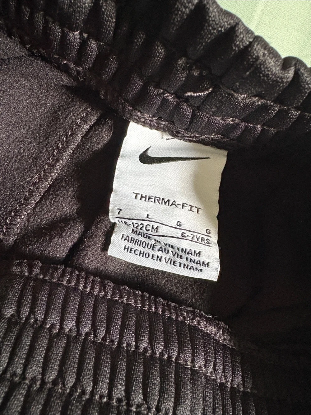Nike Kids Black Joggers with White Swoosh Graphic